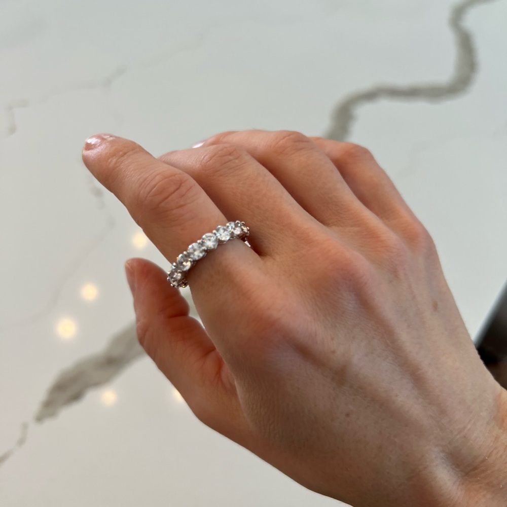 Silver eternity band with cubic zirconia